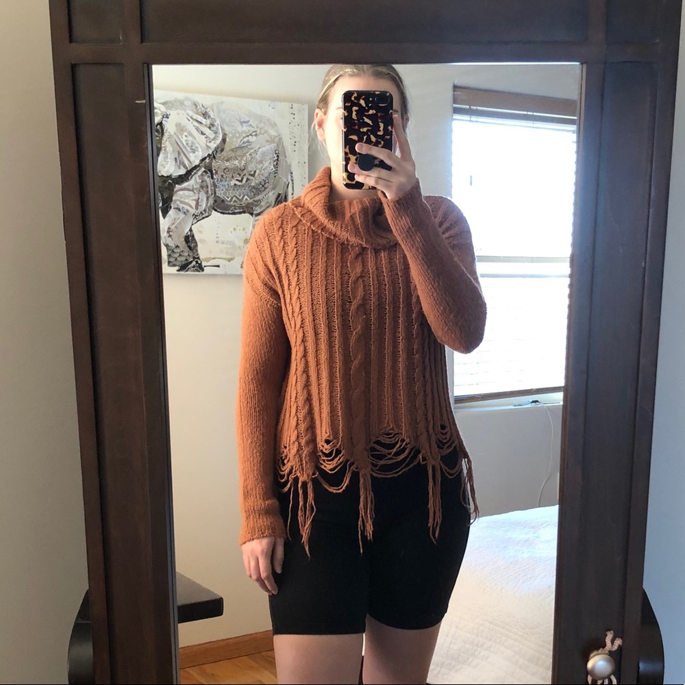 Distressed sweater